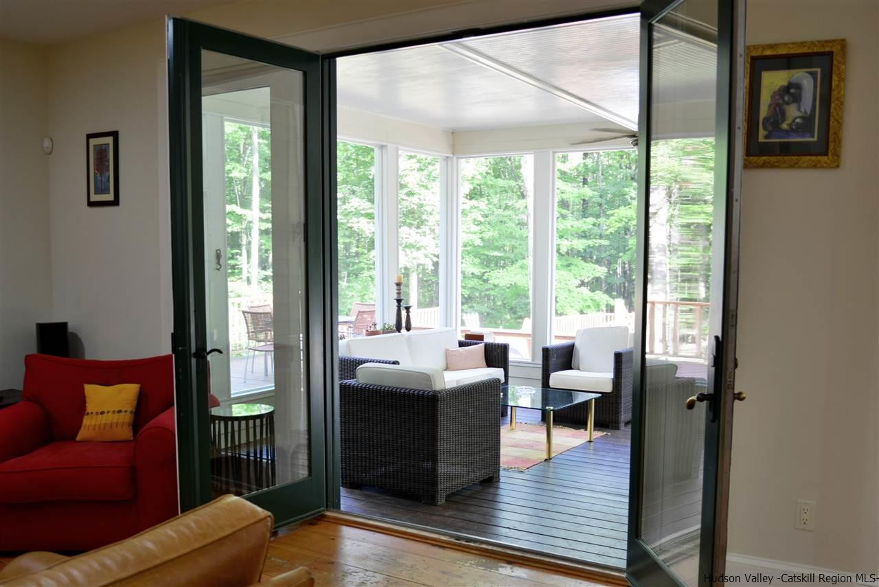 4651 Atwood Road Stone Ridge, NY 12484 - Photo 6 of 31 a living room with furniture and a large window