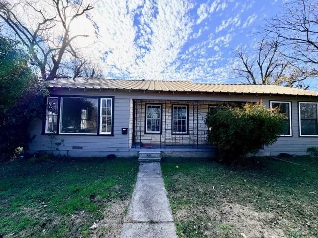 a view of a house with garden