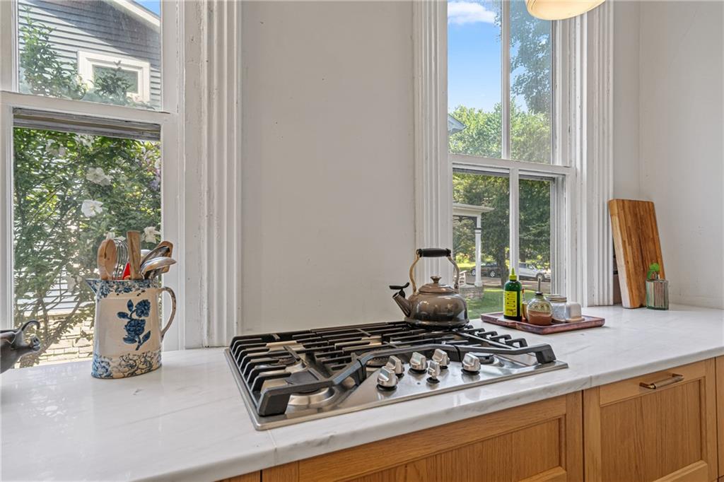 657 Maple Lane Sewickley, PA 15143 - Photo 17 of 50 Gas stove top with countertops on both sides.