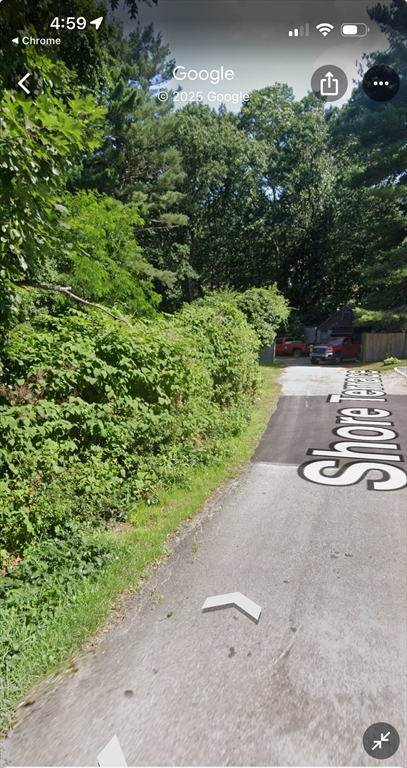 4 Shore Road Wellesley, MA 01760 - Photo 20 of 23 a view of a street with a yard