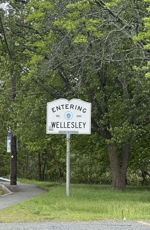 4 Shore Road Wellesley, MA 01760 - Photo 23 of 23 a sign on the side of a road