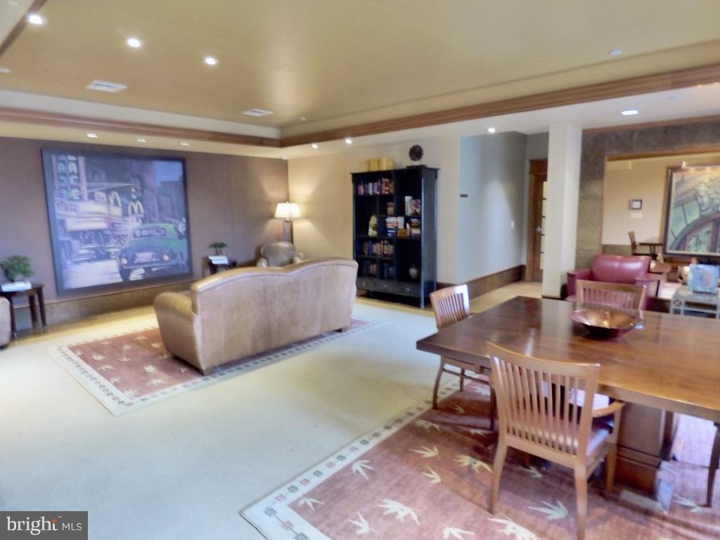 11800 Sunset Hills Road, Unit 118 Reston, VA 20190 - Photo 37 of 52 Spacious lounge with artistic flair.