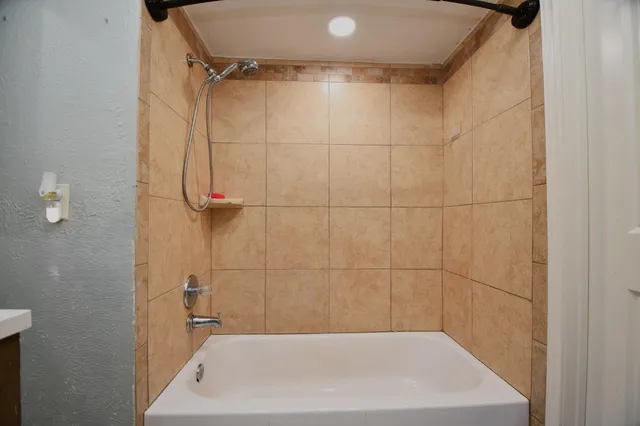 a bathroom with a bathtub