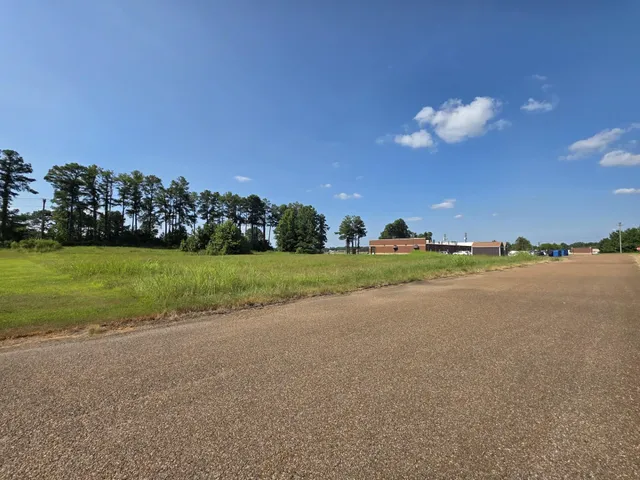 a view of a house with a big yard