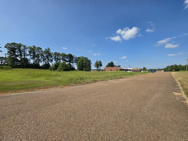 a view of a lake and green space