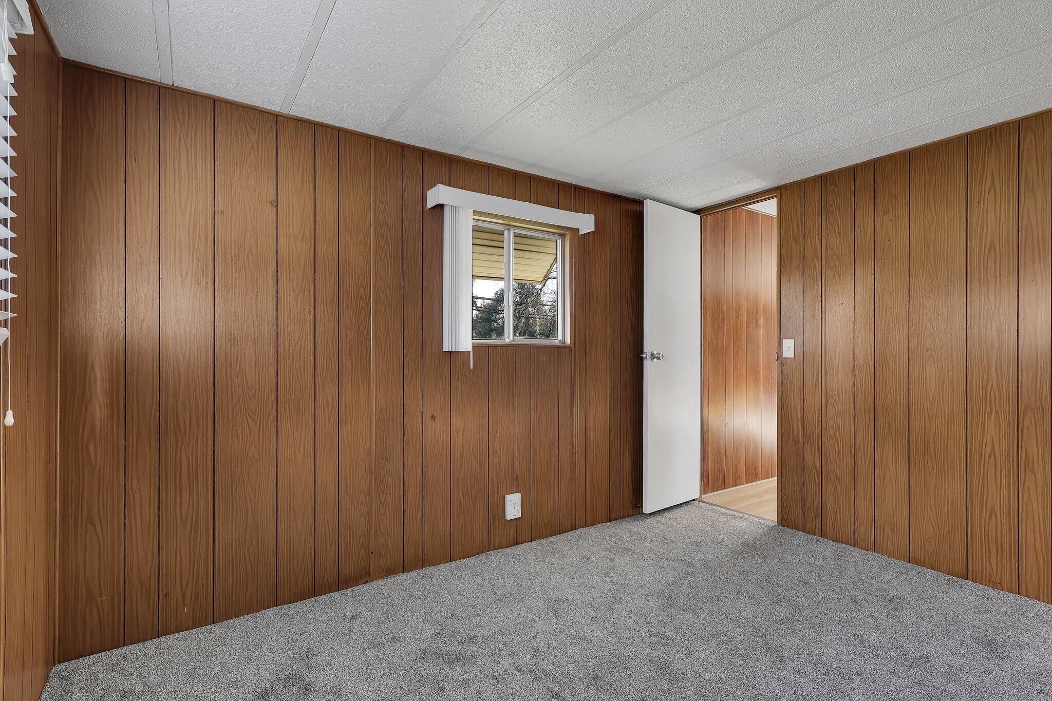 7680 Happy Valley Road Anderson, CA 96007 - Photo 13 of 39 an empty room with closet area