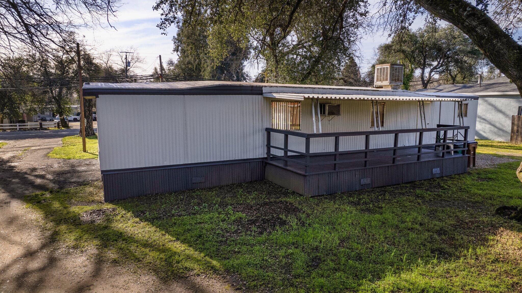 7680 Happy Valley Road Anderson, CA 96007 - Photo 2 of 39 a view of backyard with trees