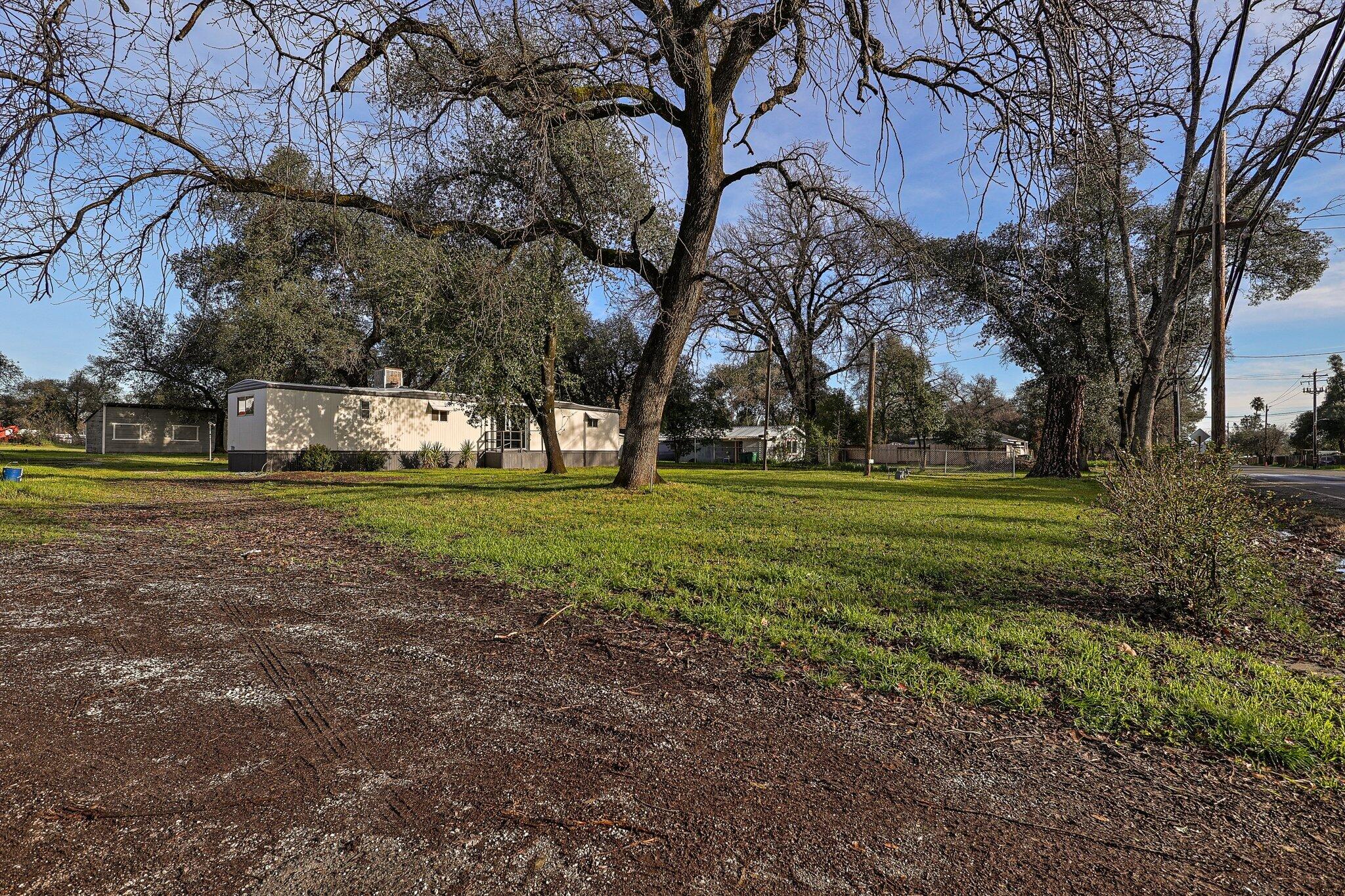 7680 Happy Valley Road Anderson, CA 96007 - Photo 21 of 39 a view of a park with large trees