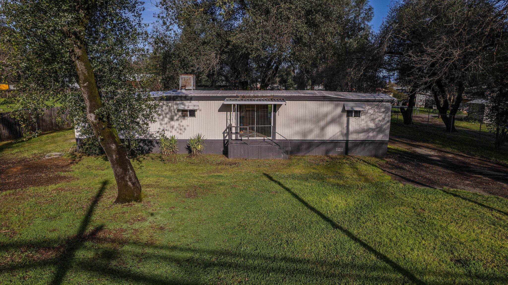 7680 Happy Valley Road Anderson, CA 96007 - Photo 29 of 39 a view of a backyard with sitting area