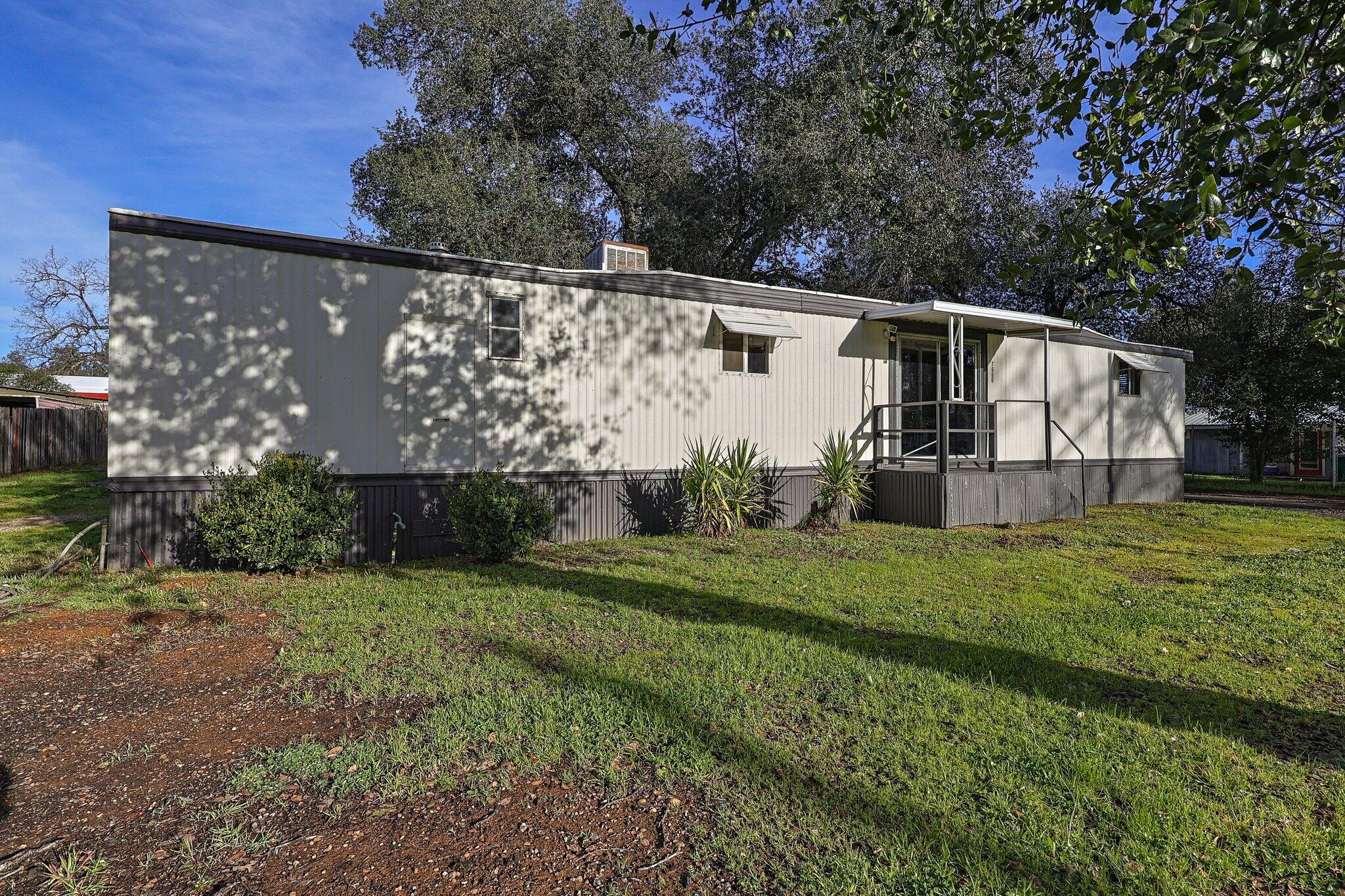 7680 Happy Valley Road Anderson, CA 96007 - Photo 3 of 39 a view of a back yard of the house