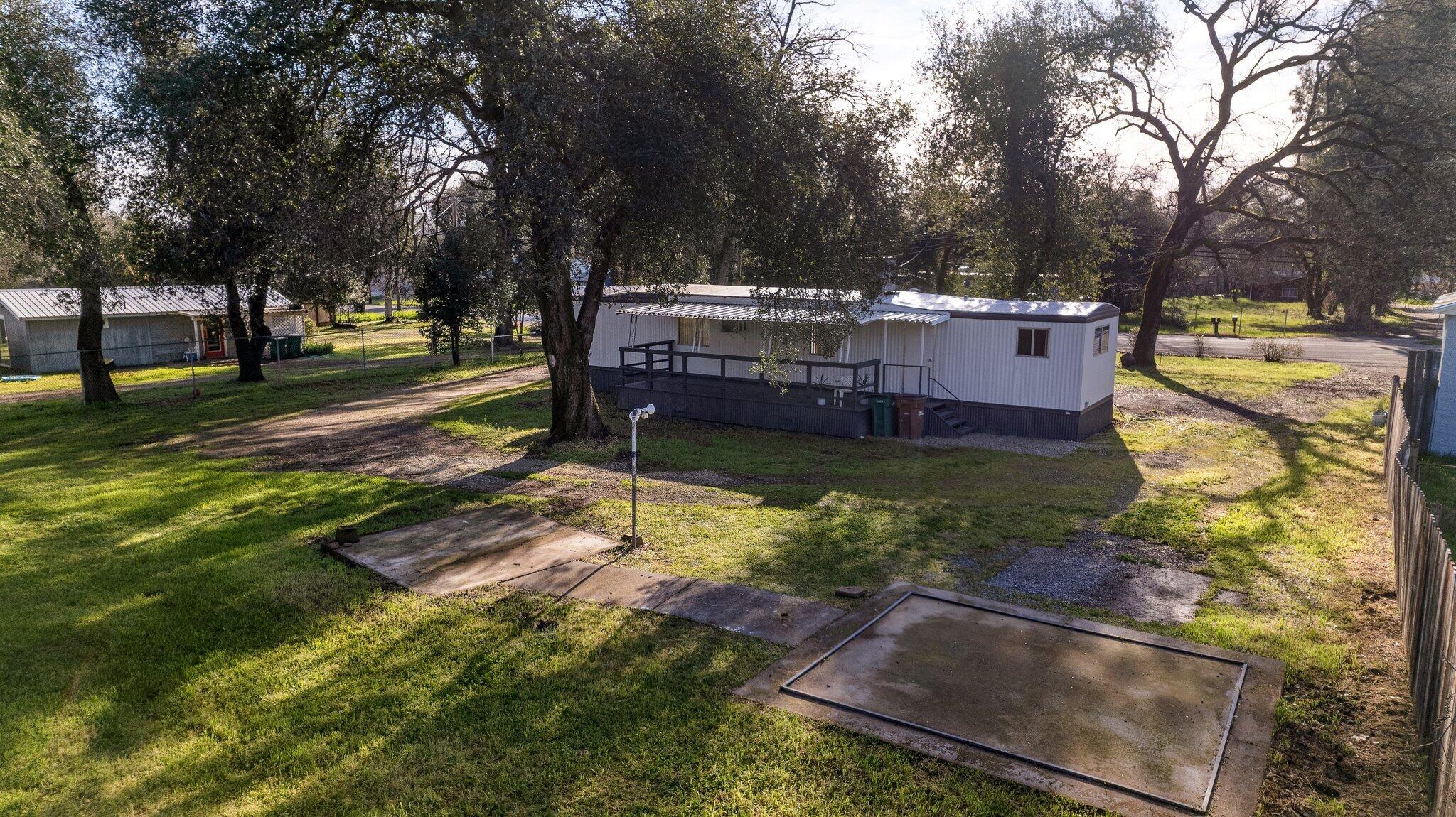7680 Happy Valley Road Anderson, CA 96007 - Photo 31 of 39 a view of a yard with tree s