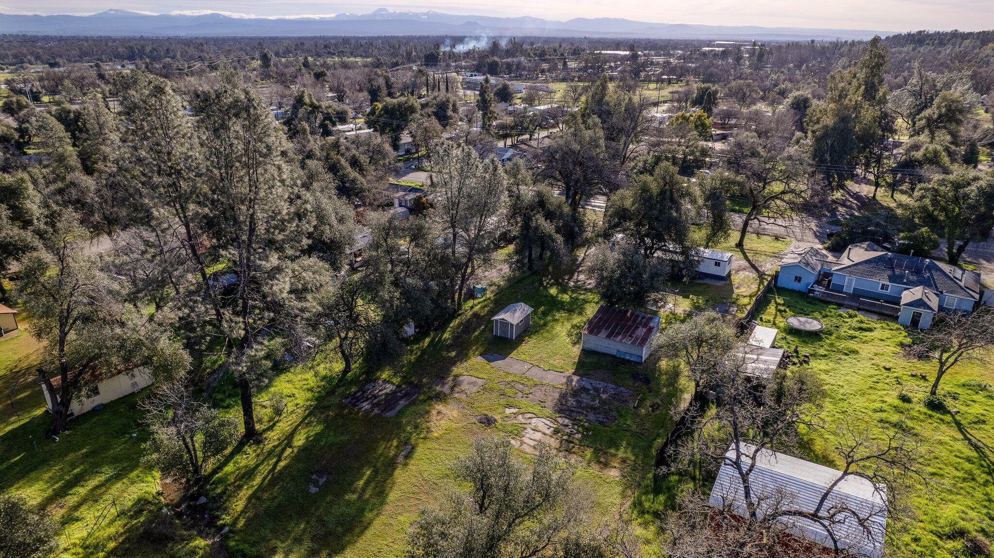 7680 Happy Valley Road Anderson, CA 96007 - Photo 38 of 39 an aerial view of residential houses with outdoor space