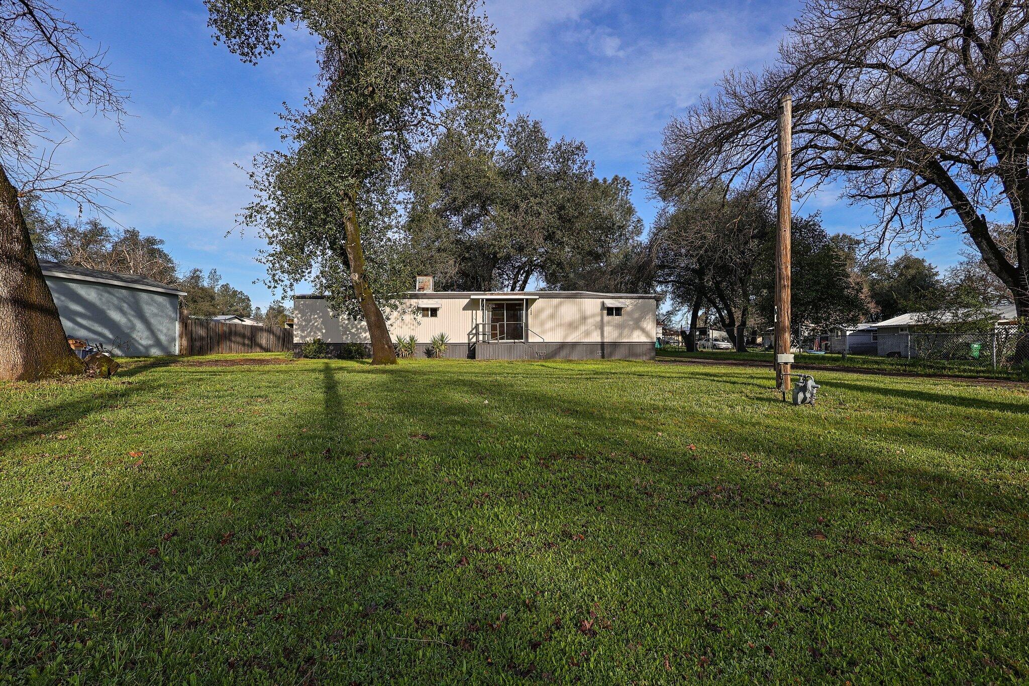 7680 Happy Valley Road Anderson, CA 96007 - Photo 4 of 39 a view of a park with large trees