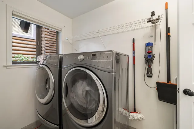 a utility room with dryer and washer
