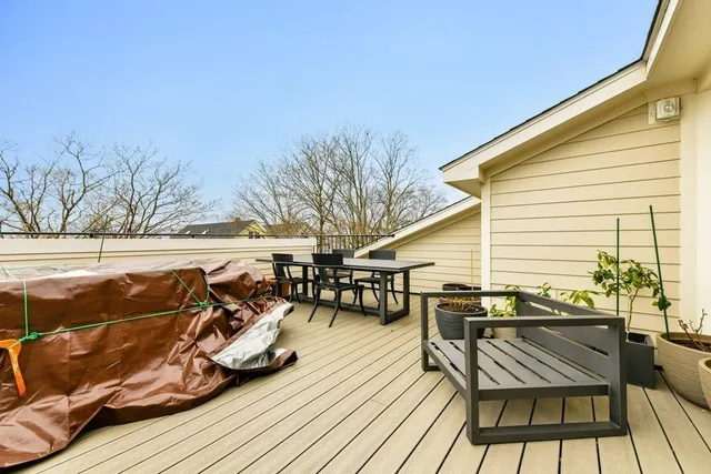 a view of sitting area with furniture and wooden deck