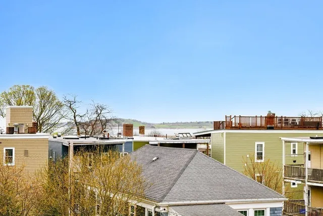 a view of a house with a ocean view