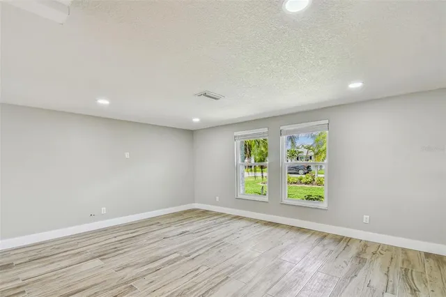 a bathroom with a sink double vanity and a mirror