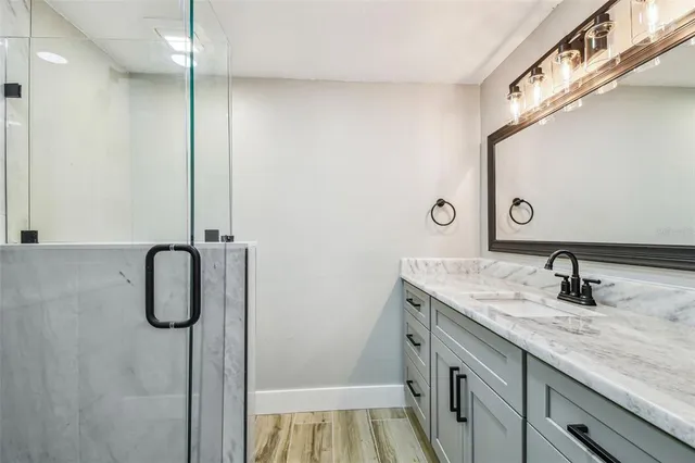 a view of a hallway with a window