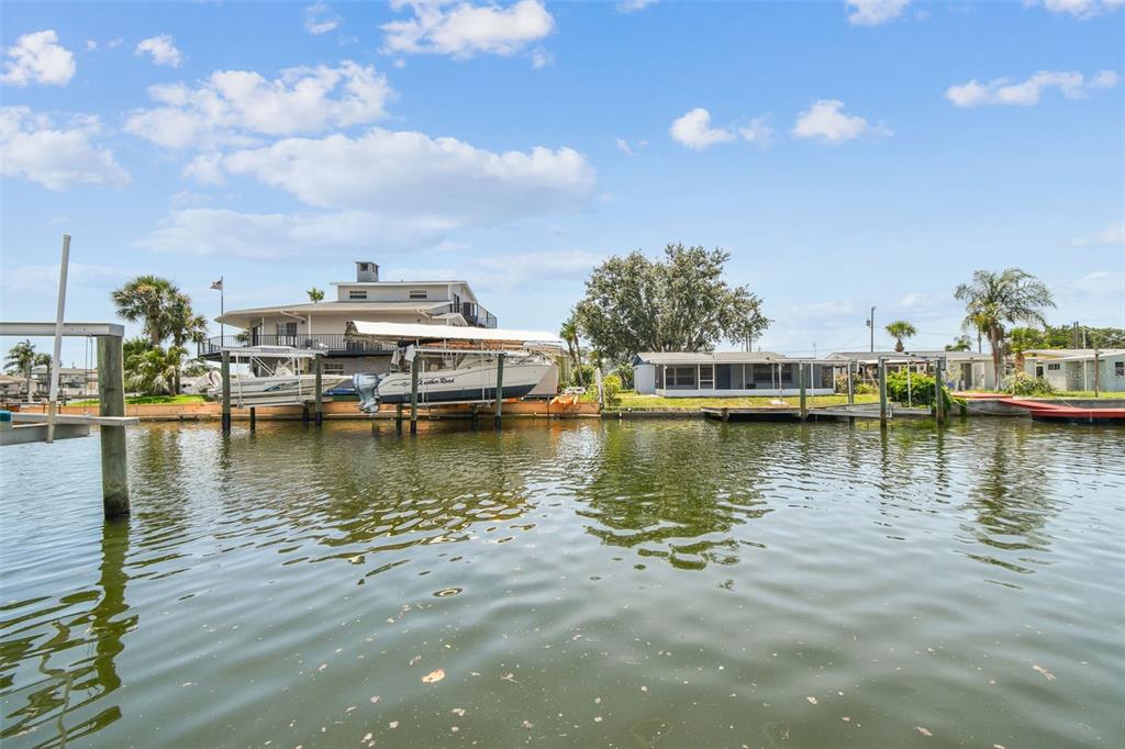 13909 Berkowitz Avenue Hudson, FL 34667 - Photo 61 of 91 a view of a lake with houses