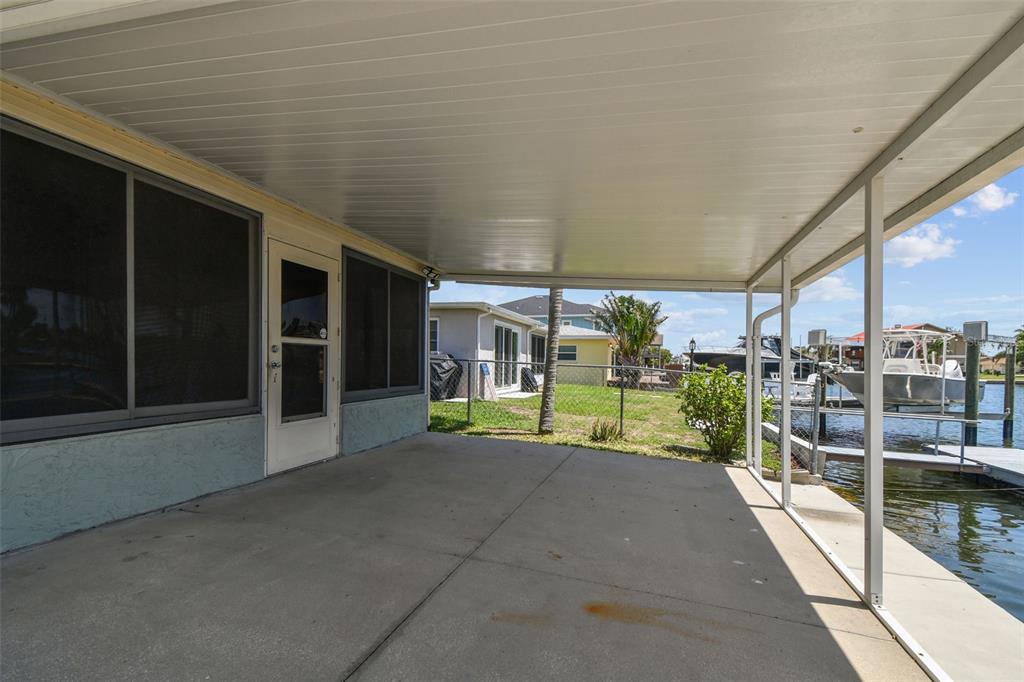 13909 Berkowitz Avenue Hudson, FL 34667 - Photo 66 of 91 a view of a house with a porch