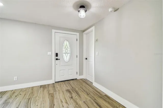 a kitchen with a sink and a stove top oven