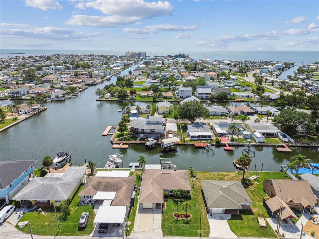 13909 Berkowitz Avenue Hudson, FL 34667 - Photo 81 of 91 an aerial view of a house with a lake view