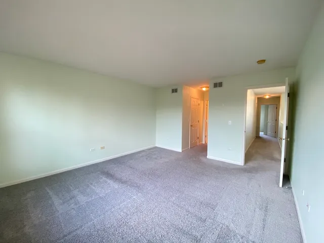 a view of an empty room and a gallery