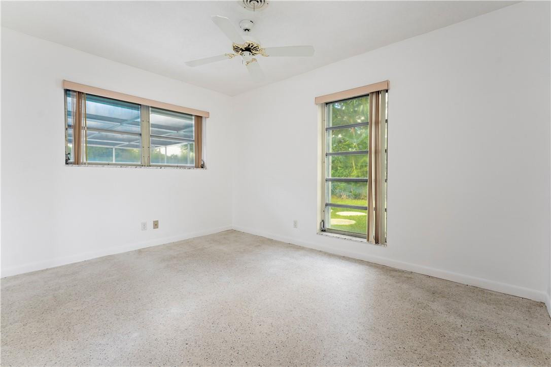 601 Northwest 12th Avenue Boca Raton, FL 33486 - Photo 19 of 27 an empty room with windows and closet