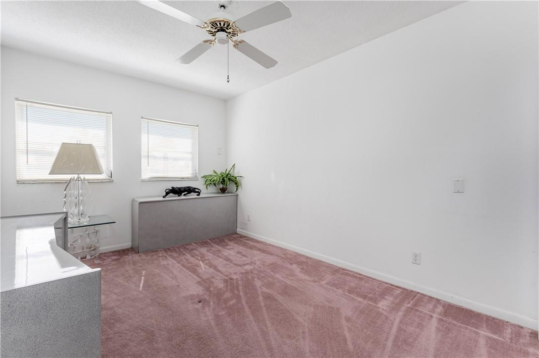 601 Northwest 12th Avenue Boca Raton, FL 33486 - Photo 22 of 27 a view of a kitchen with a sink and cabinet