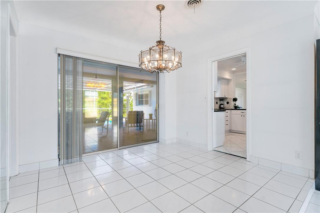 601 Northwest 12th Avenue Boca Raton, FL 33486 - Photo 8 of 27 a view of an entryway with kitchen