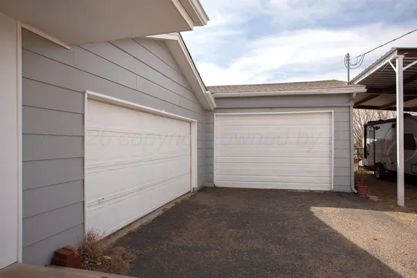 a view of a house with garage