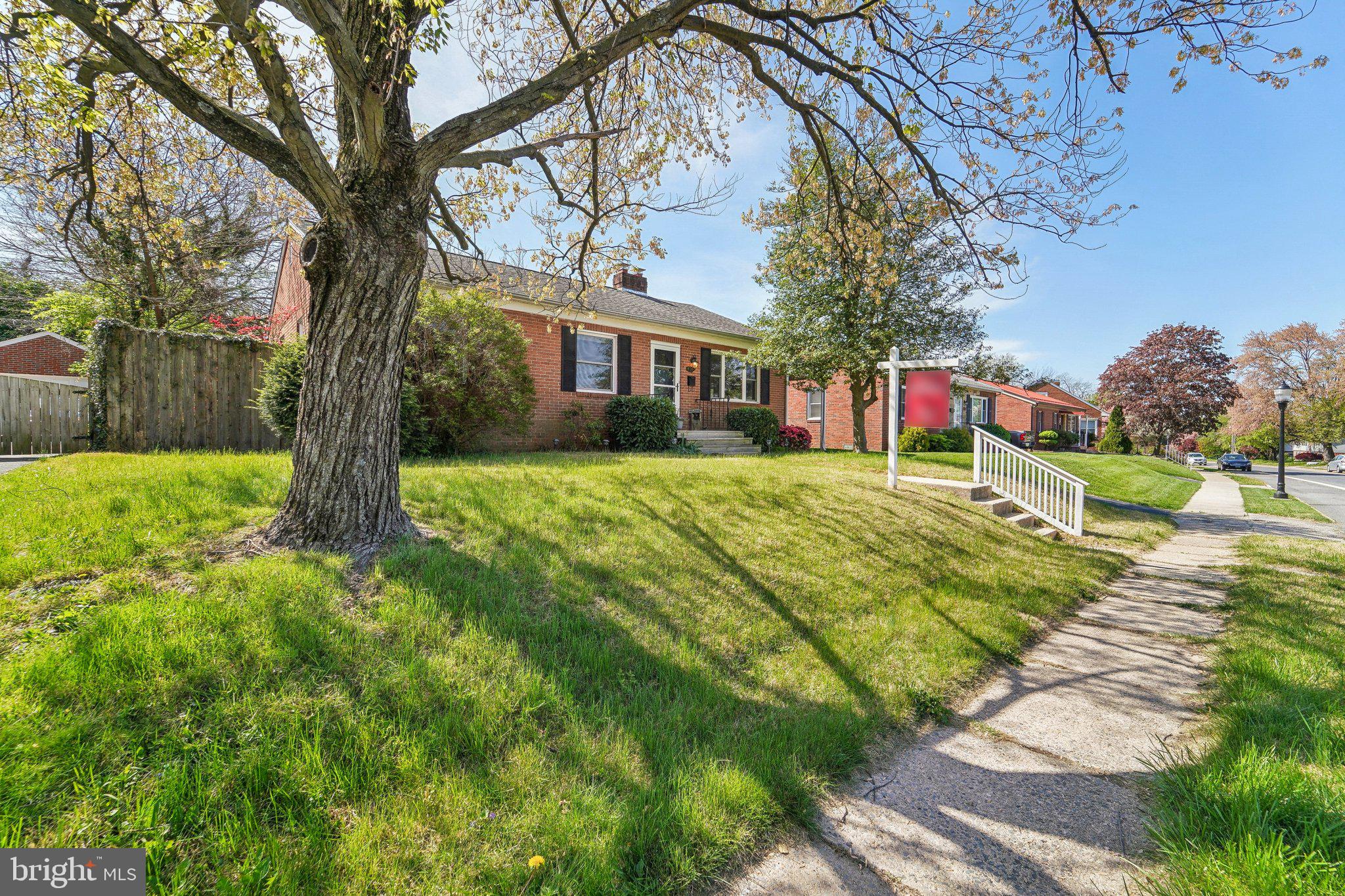 414 Biggs Avenue Frederick, MD 21702 - Photo 2 of 27 a view of a house with a yard