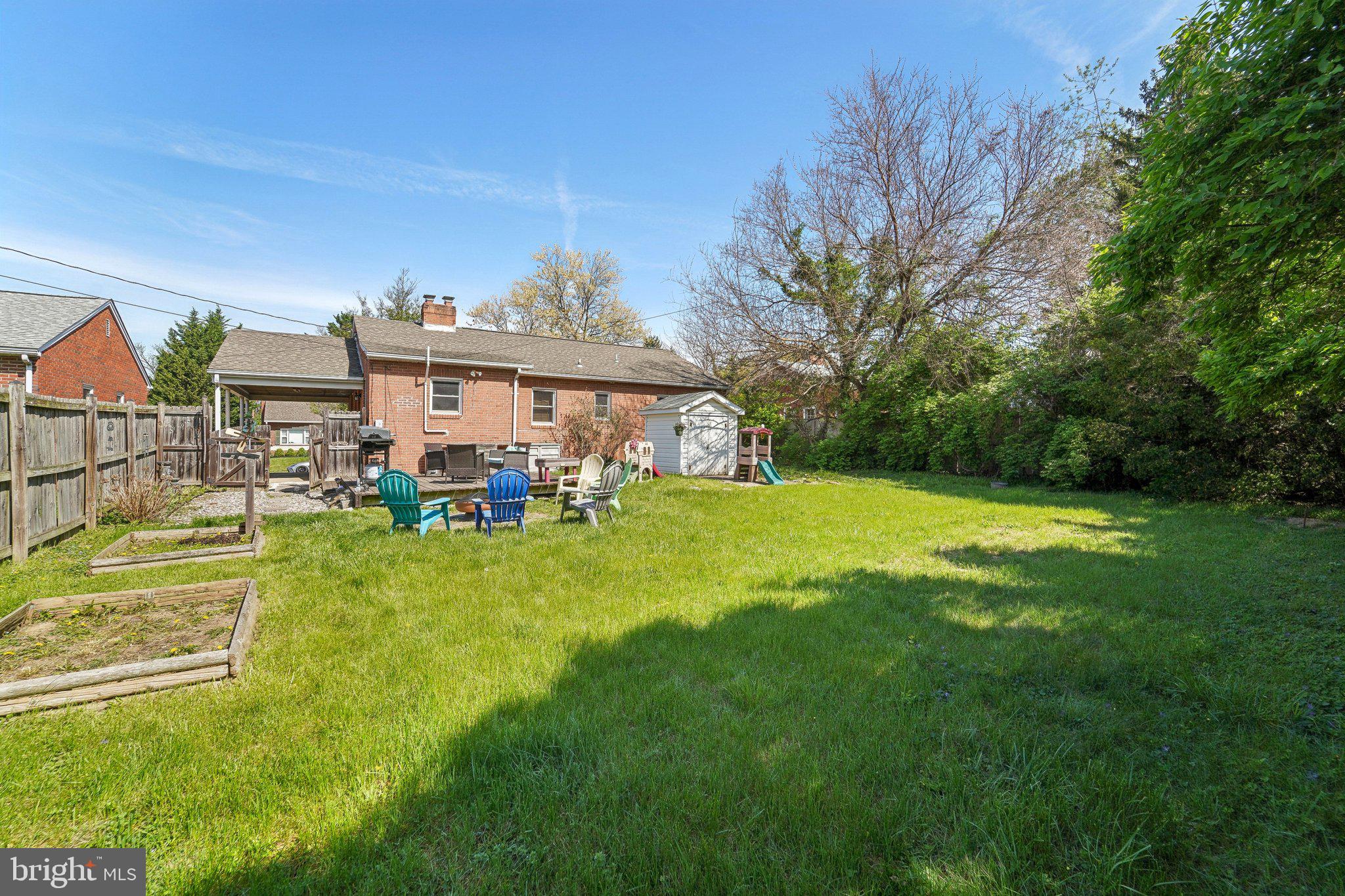 414 Biggs Avenue Frederick, MD 21702 - Photo 24 of 27 a view of a house with a big yard