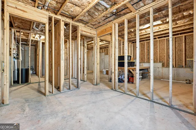 an empty room with balcony