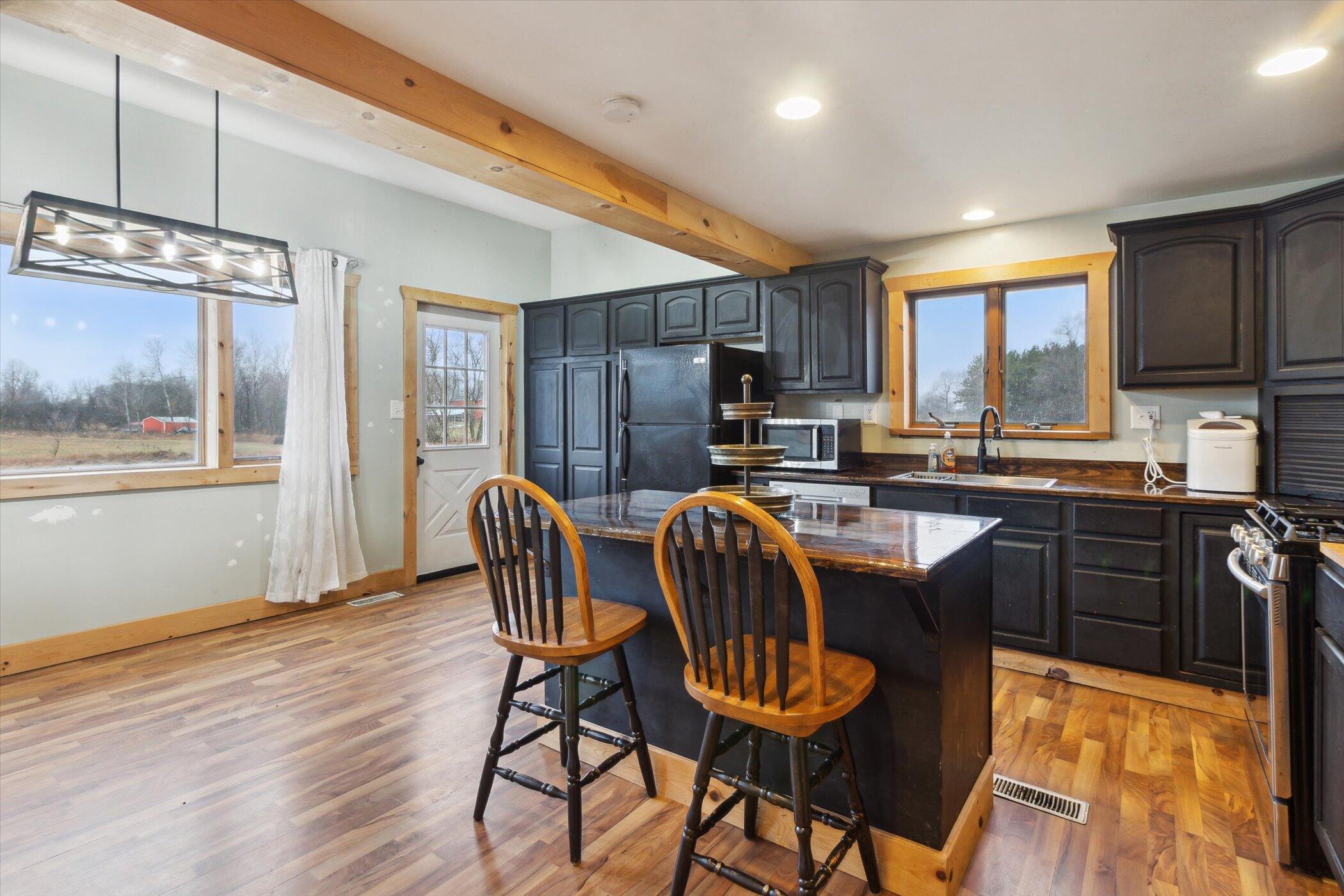 1391 Edgar Road Edmore, MI 48829 - Photo 9 of 55 09-1391-Edgar-Rd-Edmore-MI-48829-WindowS