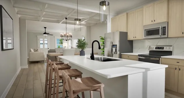 a kitchen with a table chairs stove and refrigerator
