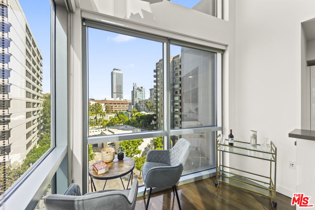 901 Flower Street, Unit 700 Los Angeles, CA 90015 - Photo 8 of 55 a view of a dining room with furniture window and outside view