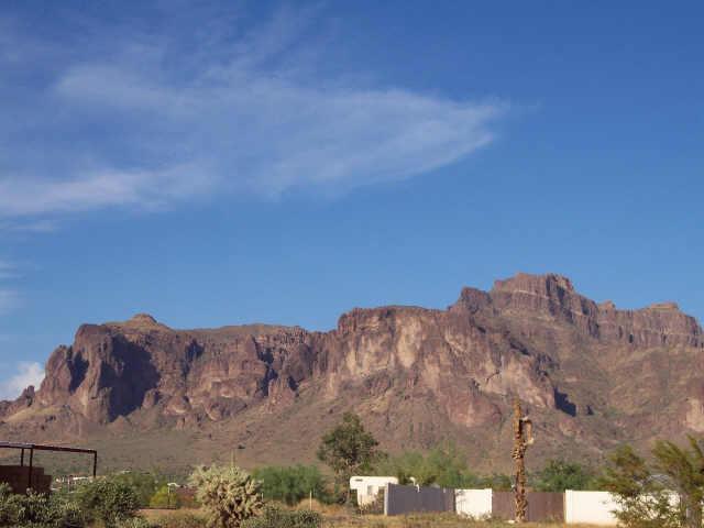 1025 North Boyd Road, Unit 24 Apache Junction, AZ 85119 - Photo 1 of 4 a view of a large building with mountain view
