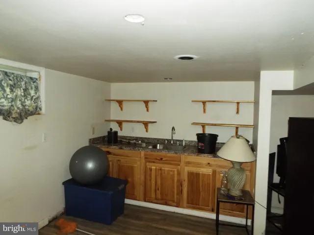 a room with furniture and a flat screen tv