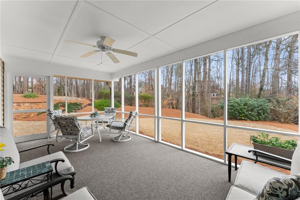 3585 Ridgewood Point Gainesville, GA 30504 - Photo 17 of 41 a living room with furniture and floor to ceiling windows