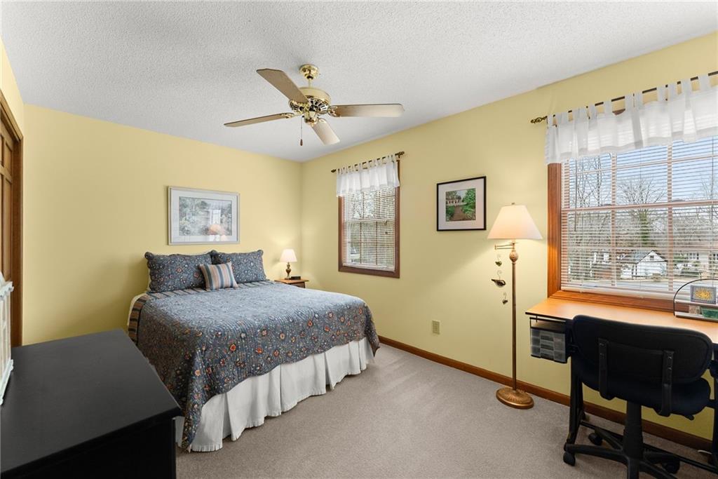 3585 Ridgewood Point Gainesville, GA 30504 - Photo 23 of 41 a bedroom with a bed and a window