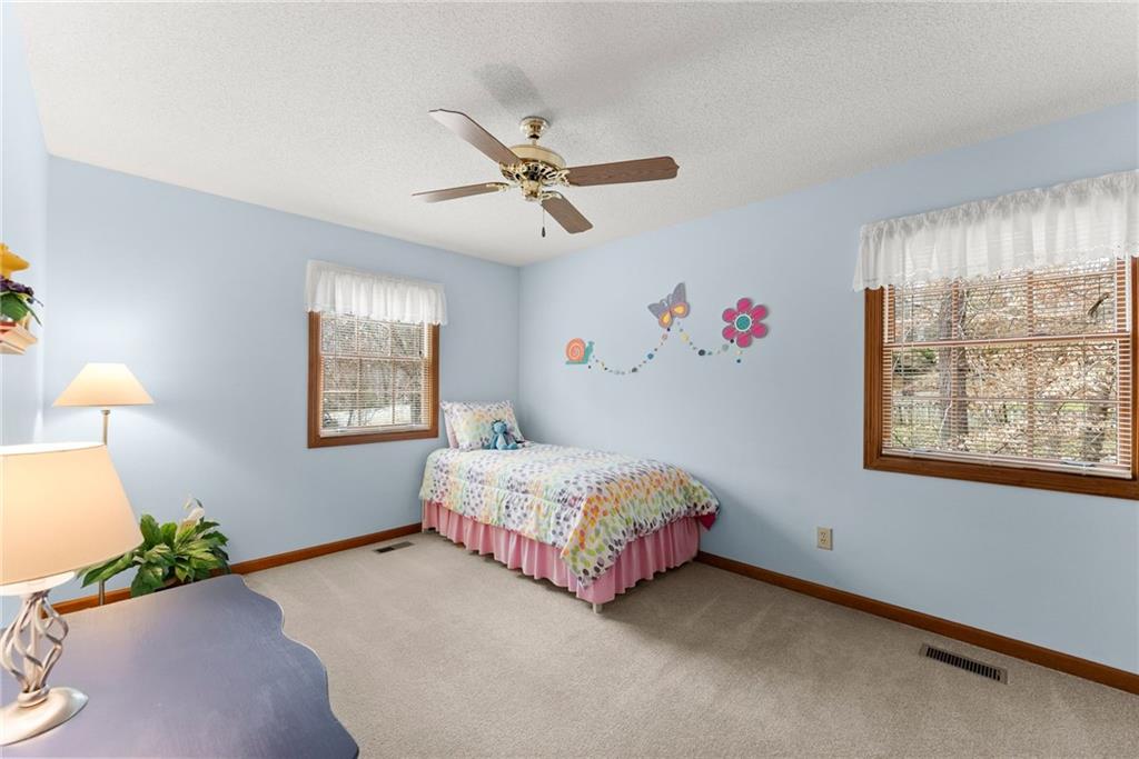 3585 Ridgewood Point Gainesville, GA 30504 - Photo 25 of 41 a living room with a bed furniture and a window
