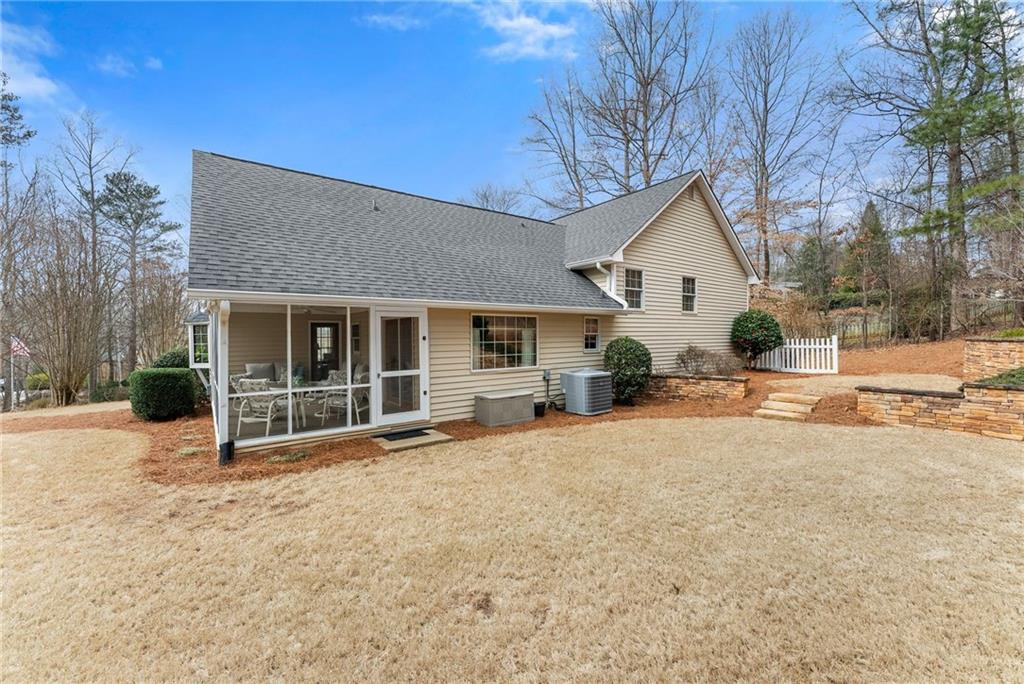 3585 Ridgewood Point Gainesville, GA 30504 - Photo 31 of 41 a view of a house with a yard covered in snow