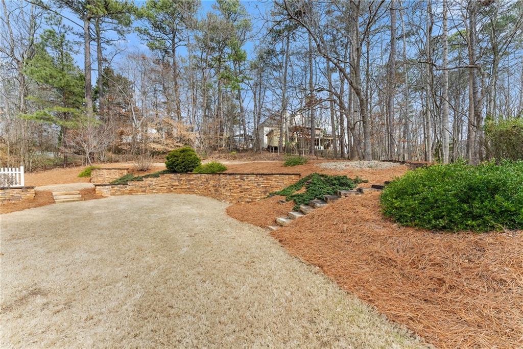 3585 Ridgewood Point Gainesville, GA 30504 - Photo 35 of 41 a street view with large trees