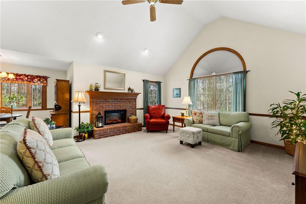 3585 Ridgewood Point Gainesville, GA 30504 - Photo 5 of 41 a living room with furniture and a fireplace