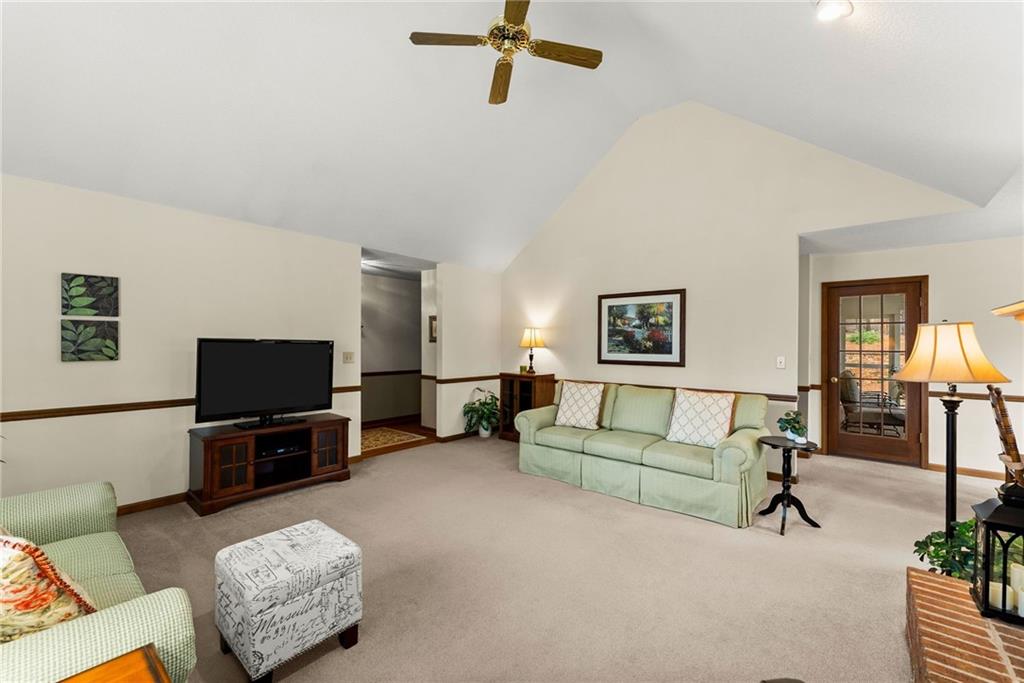 3585 Ridgewood Point Gainesville, GA 30504 - Photo 7 of 41 a living room with furniture and a flat screen tv