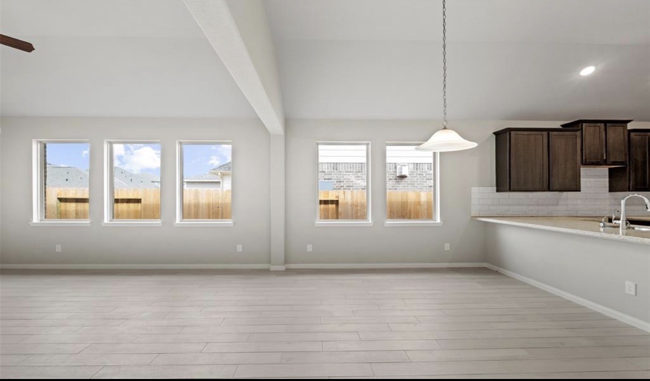 4327 Reese Ravine Lane Katy, TX 77493 - Photo 15 of 34 a view of a kitchen with a sink and windows