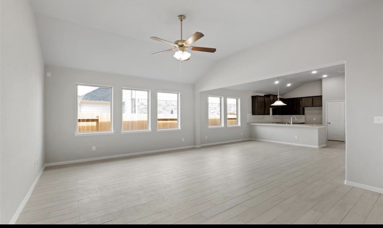 4327 Reese Ravine Lane Katy, TX 77493 - Photo 17 of 34 a view of a livingroom with a ceiling fan and window