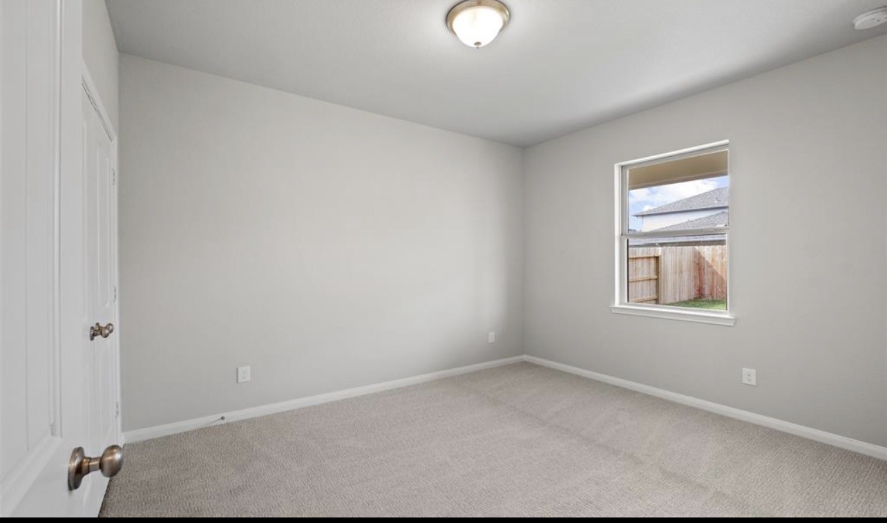 4327 Reese Ravine Lane Katy, TX 77493 - Photo 24 of 34 an empty room with windows