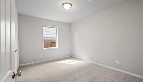 an empty room with a window